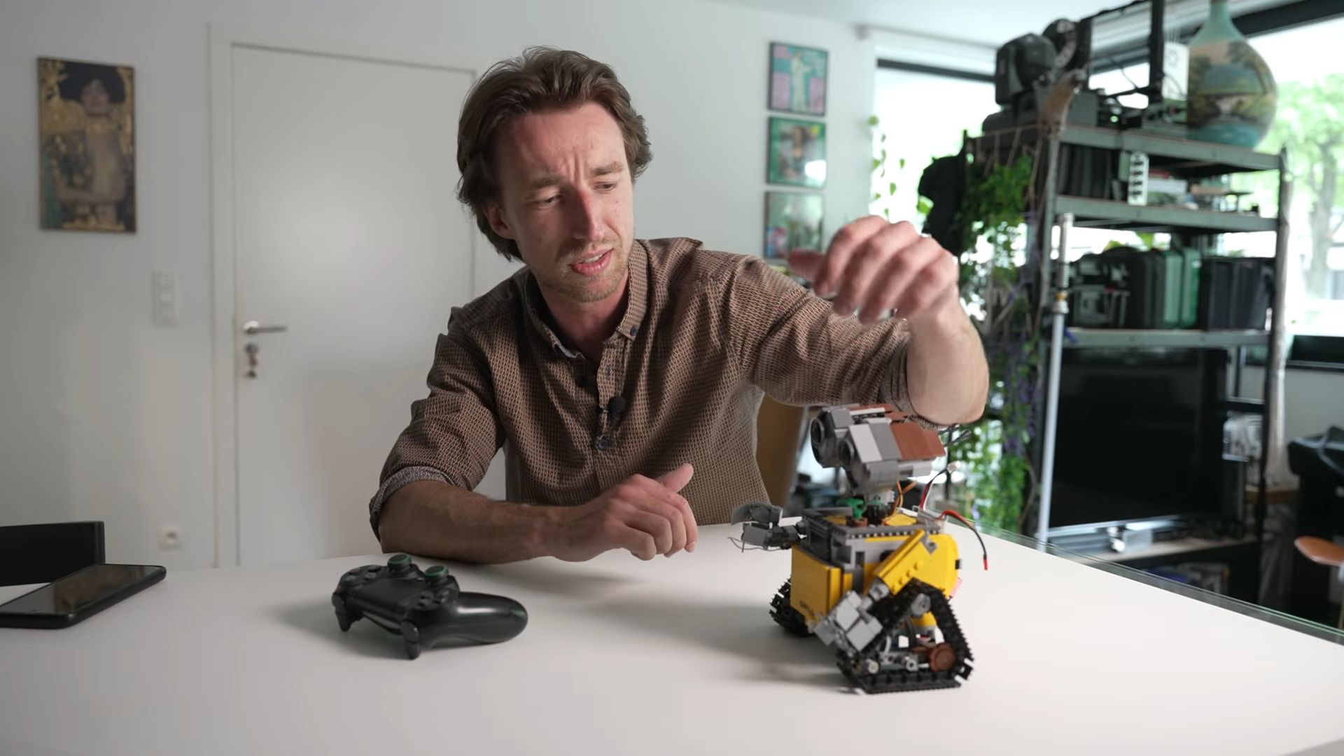 Someone built a fully motorized Lego WALL-E controlled by a PS4 controller, complete with a built-in taser